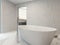 Pure clean white bathroom interior with bathtub