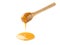 Pure Honey dripping from honey dipper