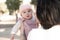 pure joy as a young Asian Korean mother lovingly plays with her little baby girl, creating a lasting affection happiness bond -