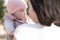 pure joy as a young Asian Korean mother lovingly plays with her little baby girl, creating a lasting affection happiness bond -