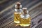 Pure organic aroma essential oil in glass bottle isolated on wooden background beauty treatment. Fragrant oil spa concept wellness