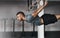 Pure power. Cropped shot of a young man working out on the gymnastics rings.