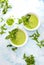 Pureed edamame soup with fresh herbs seasoning  top down view