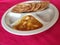 Puri and Potato Curry aalu sabji - an indian cuisine in round plate.