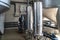 Purified drinking water factory or plant, large iron tanks and water purification filters and automation filtration