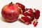 Purified pomegranate fruit on a white background