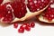 Purified pomegranate fruit on a white background