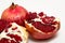 Purified pomegranate fruit on a white background