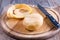 Purified yellow turnips on a wooden table