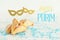 Purim celebration concept & x28;jewish carnival holiday& x29;. Traditional hamantaschen cookies with cute gold masks