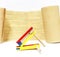 Purim . Colorful wooden noisemaker with Megillah Purim holiday background