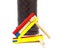 Purim. Colorful wooden noisemaker with Megillah Purim holiday background