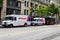 Purolator, FedEx and UPS trucks parked on the street