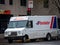 Purolator logo on one of their delivery trucks in a street of Montreal, Quebec.