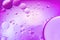 Purple abstract background with oil drops