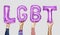 Purple alphabet balloons forming the word LGBT