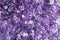 Purple Amethyst background. Violet Crystal Stone macro mineral