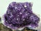 Purple amethyst stone isolated .Glossy violet texture of natural amethyst.