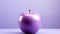 a purple apple sitting on top of a purple background