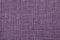 Purple background with braided checkered pattern, closeup. Texture of the weaving fabric, macro.