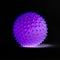 Purple ball with blue spikes glowing on black background