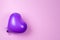 Purple ballon on purple background