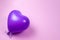 Purple ballon on purple background