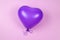 Purple ballon on purple background