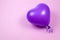 Purple ballon on purple background