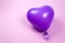 Purple ballon on purple background