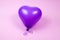 Purple ballon on purple background