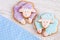 Purple and blue Sheep gingerbread cookies on white wooden background