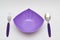 Purple bowl, spoon and fork