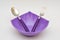 Purple bowl, spoon and fork