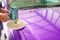Purple car body color polishing by electric drill