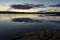 purple cloud reflection on water