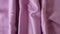 Purple color satin fabric texture seamless with beautiful closeup and shiny detail fabric