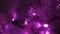 Purple colored Christmas decorations flashing LED lights garland at night.