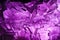 purple cubic fluorite crystal backlit