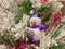 Purple cute snowman in the snow Christmas tree
