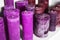 Purple cylindrical candles on a shelf apartments decor