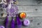 Purple dream catcher on wooden background