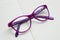 Purple Eyeglasses, Children Spectacles or Glasses on Neutral background