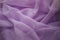 Purple fabric. Lilac textiles, rags violet cloth Photo background.