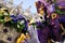 Purple flower seller mask in venice carnival