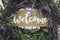 purple flower welcome door wreath decor