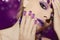 Purple French manicure and makeup.