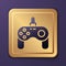Purple Gamepad icon isolated on purple background. Game controller. Gold square button. Vector