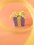 Purple Gift box at the end of the spiral yellow ribbon, orange background, vertical.