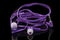 Purple headphones clips on a black background